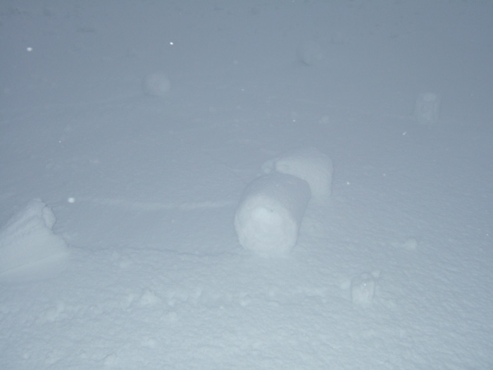 On the Monday morning the new snow had blown and rolled itself into strange shapes on the lake